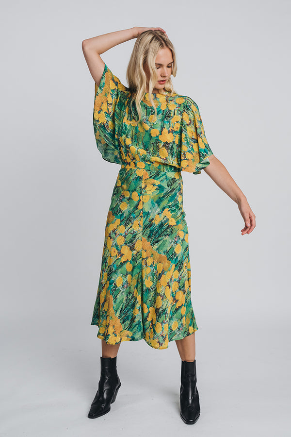 Reidar frill shirt in green and yellow paired with matching reidar frill skirt. Hálo x Reidar Särestöniemi EXCLUSIVE