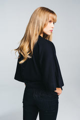 Tundra box shirt in black paired with kajo slip skirt in black. Video. Hálo from north